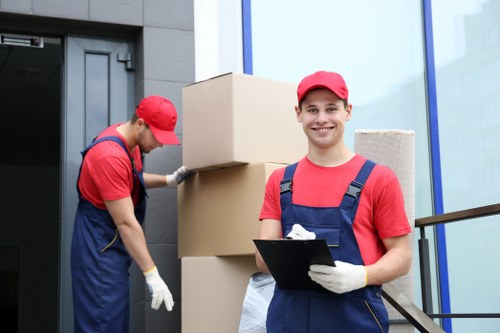 Professional flat removal service handling belongings in Upperclapton