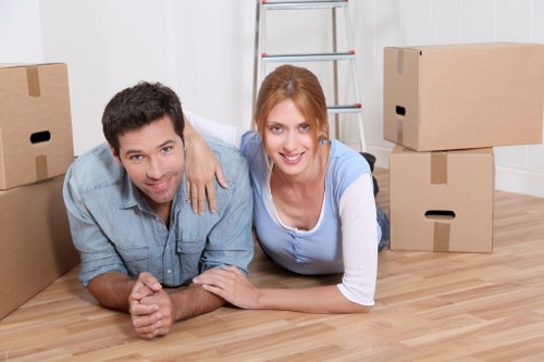 A moving team handling furniture during a compact local relocation
