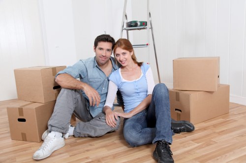 Small removals service transporting boxes and household items in Upperclapton