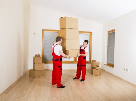 Careful wrapping of fragile items by Upperclapton packing specialists